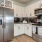 a kitchen with white cabinets